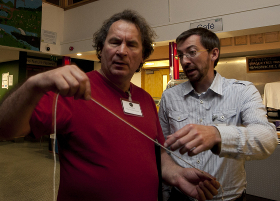 DSD's Steve Owens (r) takes Terry White (l) of Waltham Forest Blind Association on a tour of the night sky